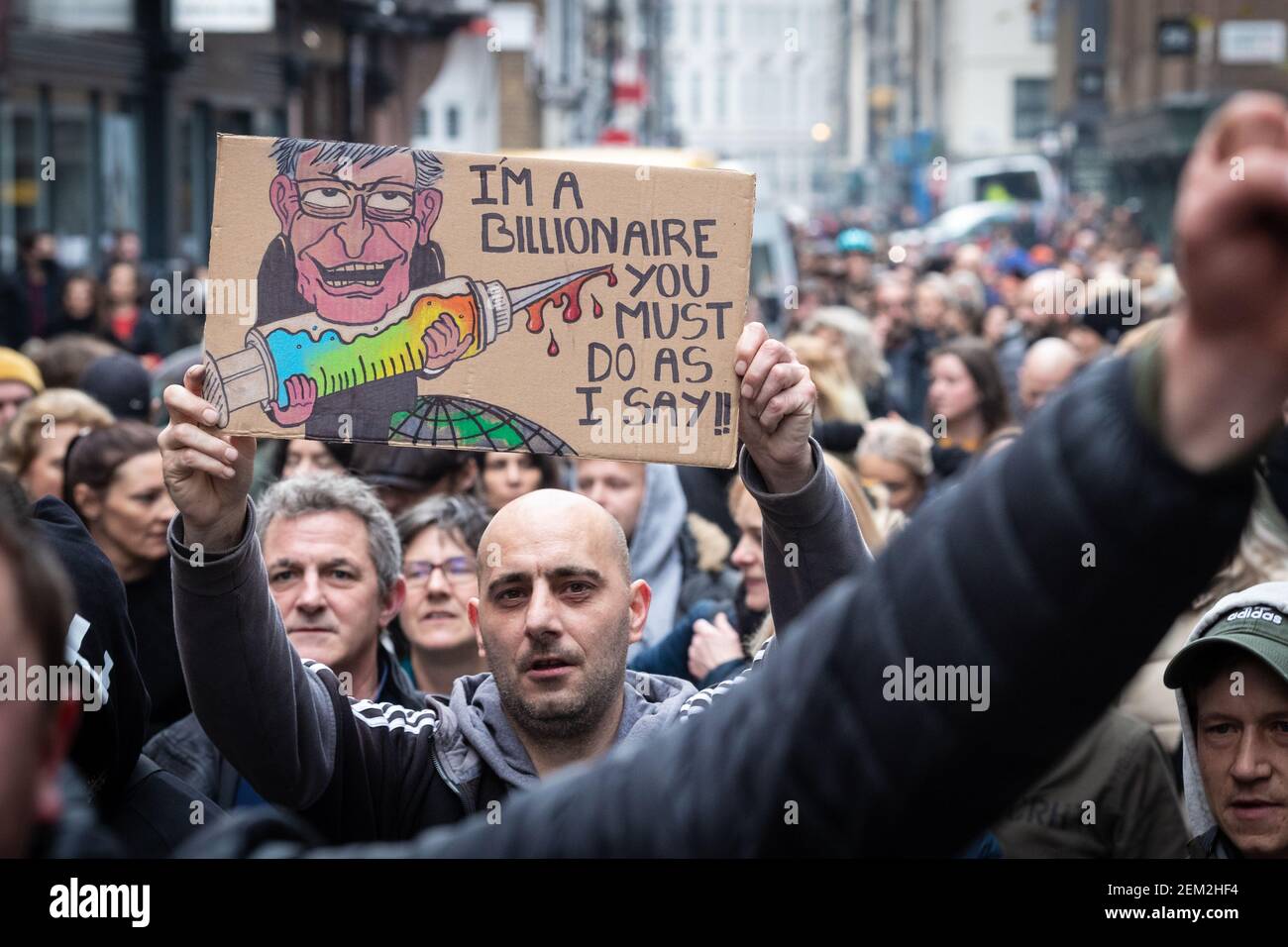 A protester holding a placard expressing his opinion as they march from Marble  Arch through the city during the demonstration. Lockdown protesters take to  the streets again. The Save Our Rights movement,