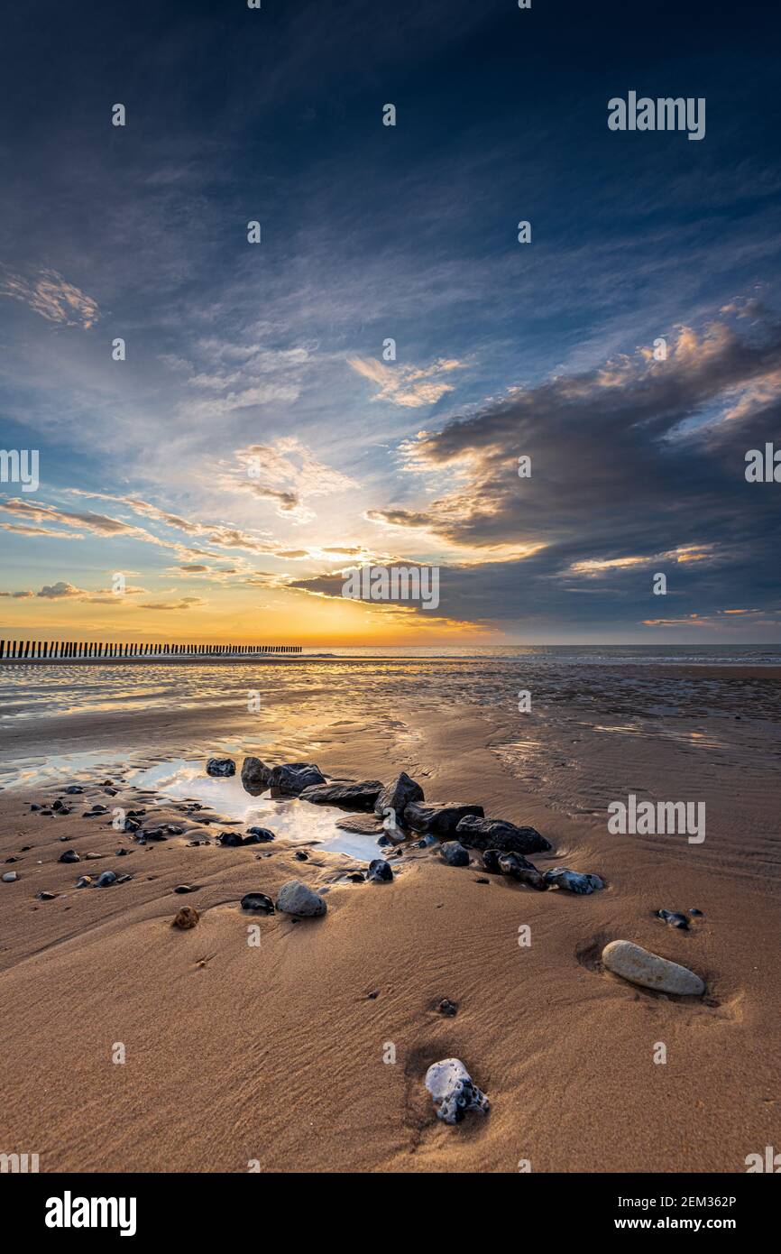 Coucher de soleil sur la plage de Sangatte, France, Hauts de France Stock Photo