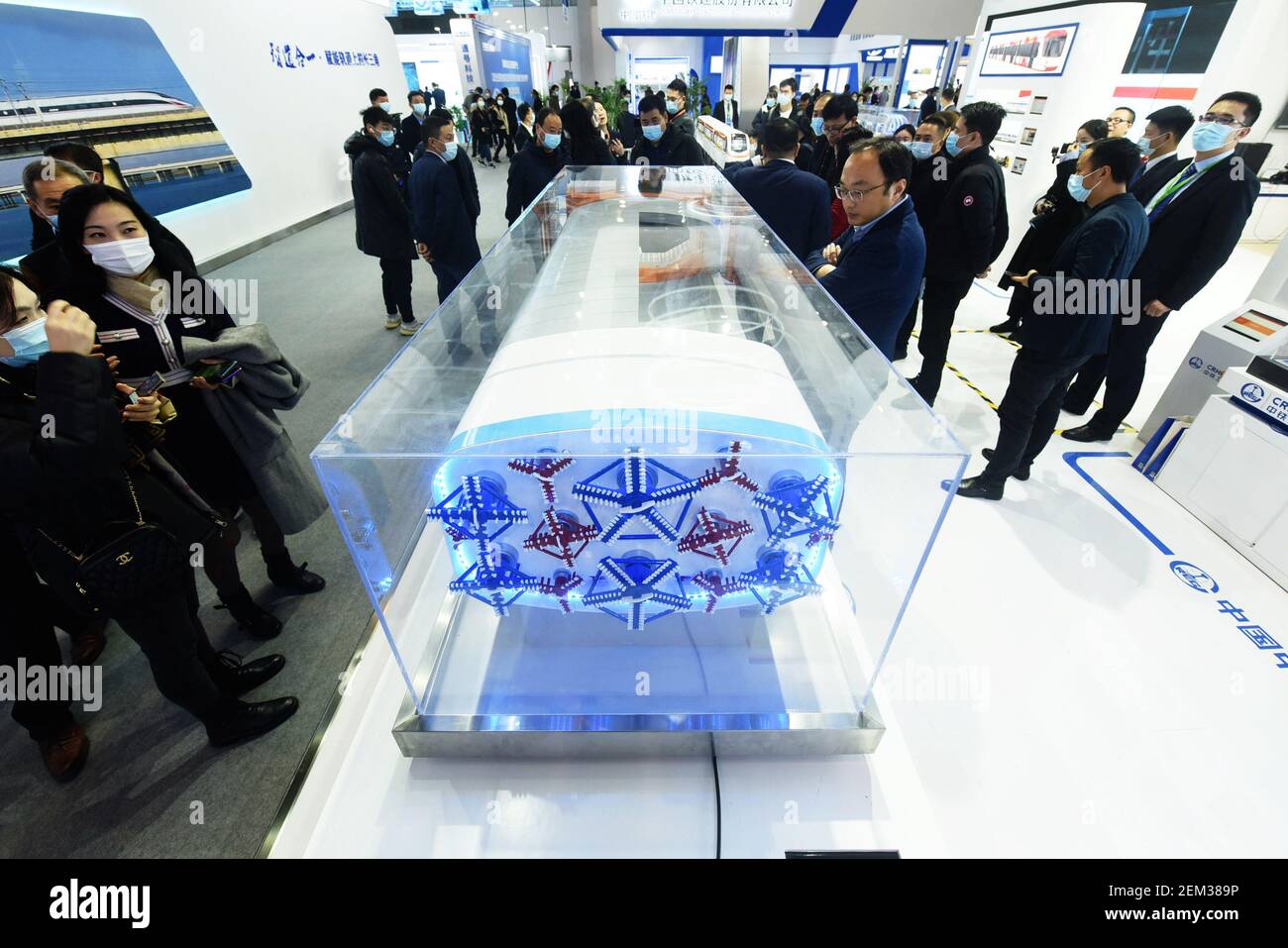 HANGZHOU, CHINA - DECEMBER 4, 2020 - Visitors look at a model of the ...