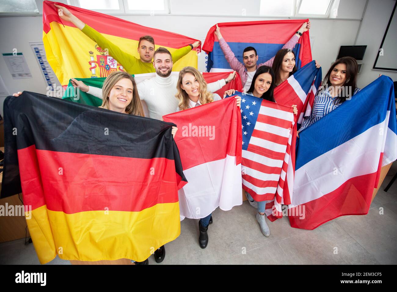 Students holding flags countries hires stock photography and images