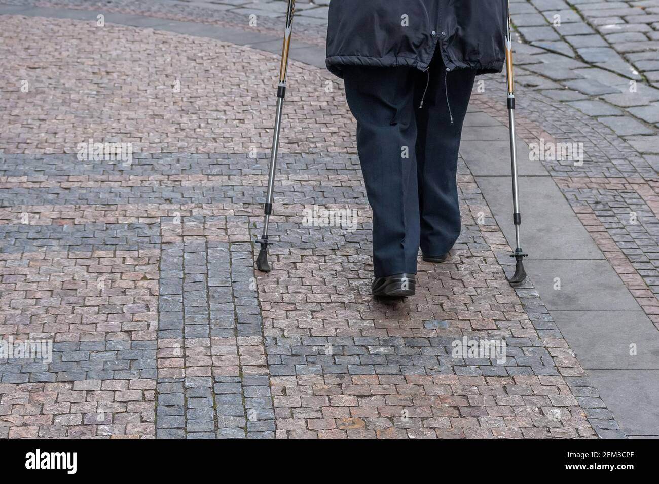 Old woman walking stick on hi-res stock photography and images - Alamy