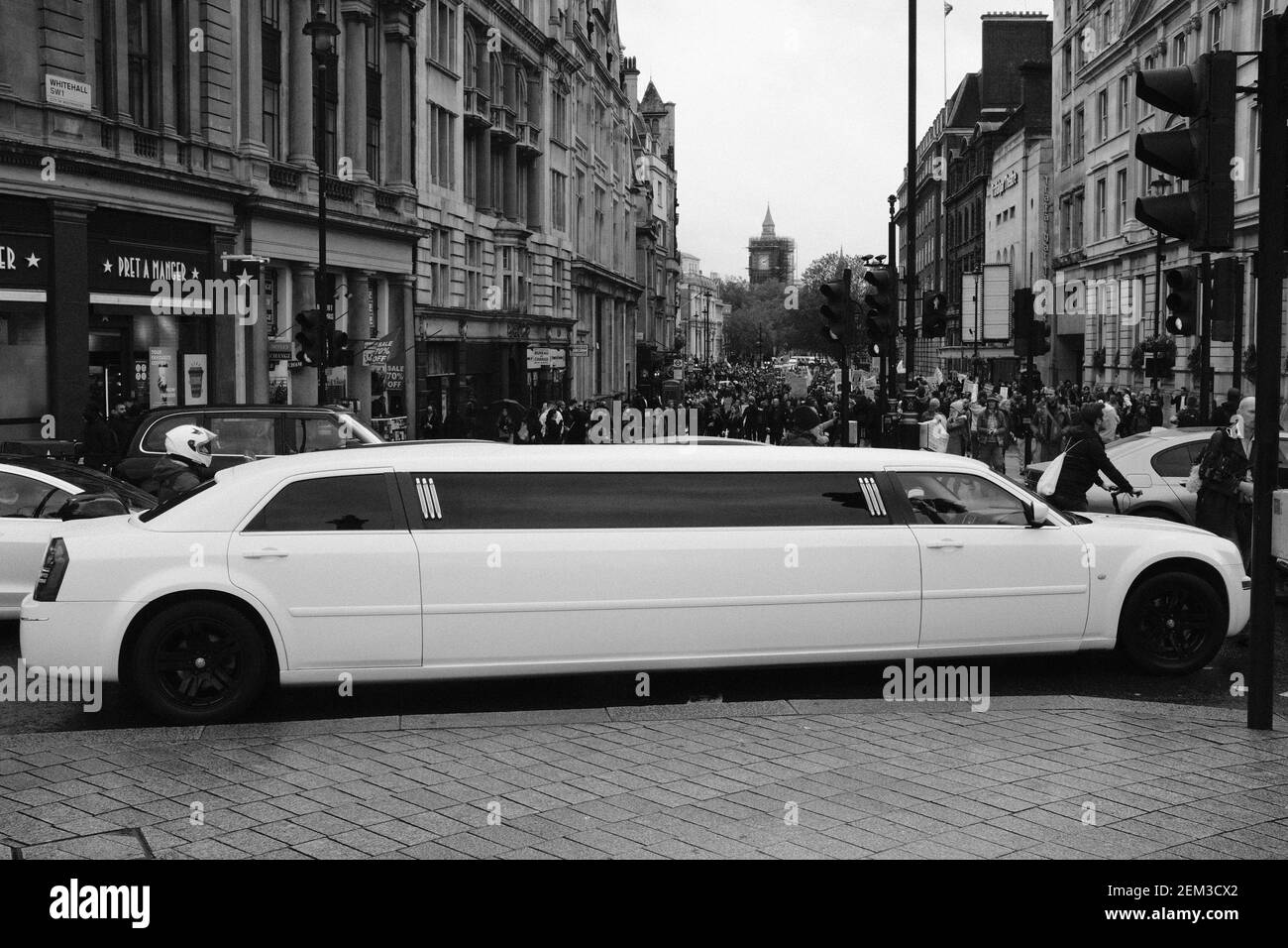 LONDON - 24TH OCTOBER 2020: A white stretched limousine driving past Trafalgar Square in London. Stock Photo