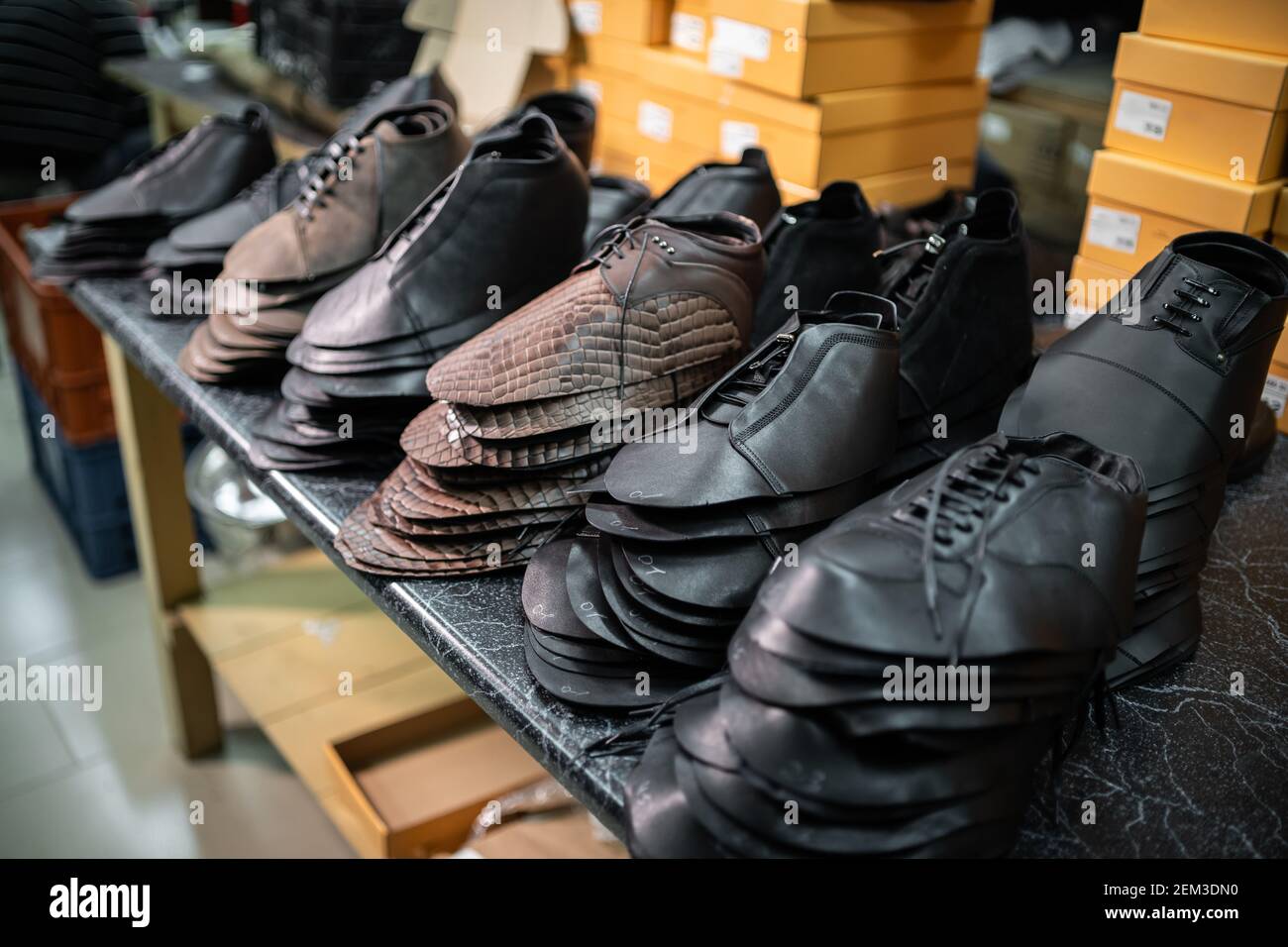leather molding for modern shoes on factory Stock Photo Alamy