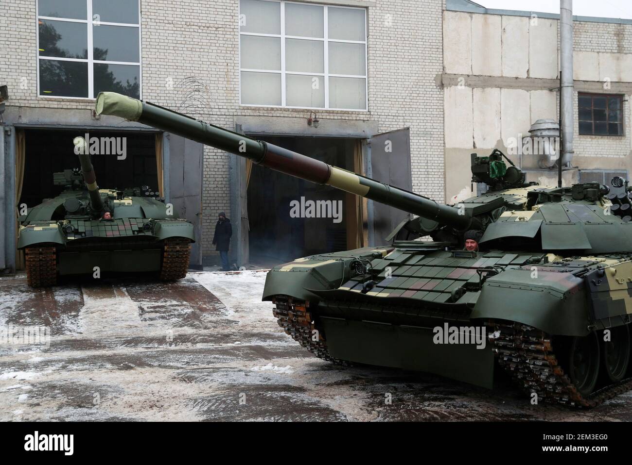 Employees Drive Modernized T 72 Battle Tanks At The Kyiv Armoured Plant Before The Ceremony Of Handing Over To The Servicemen Of Ukrainian Armed Forces In Kyiv Ukraine February 24 21 Reuters Valentyn Ogirenko