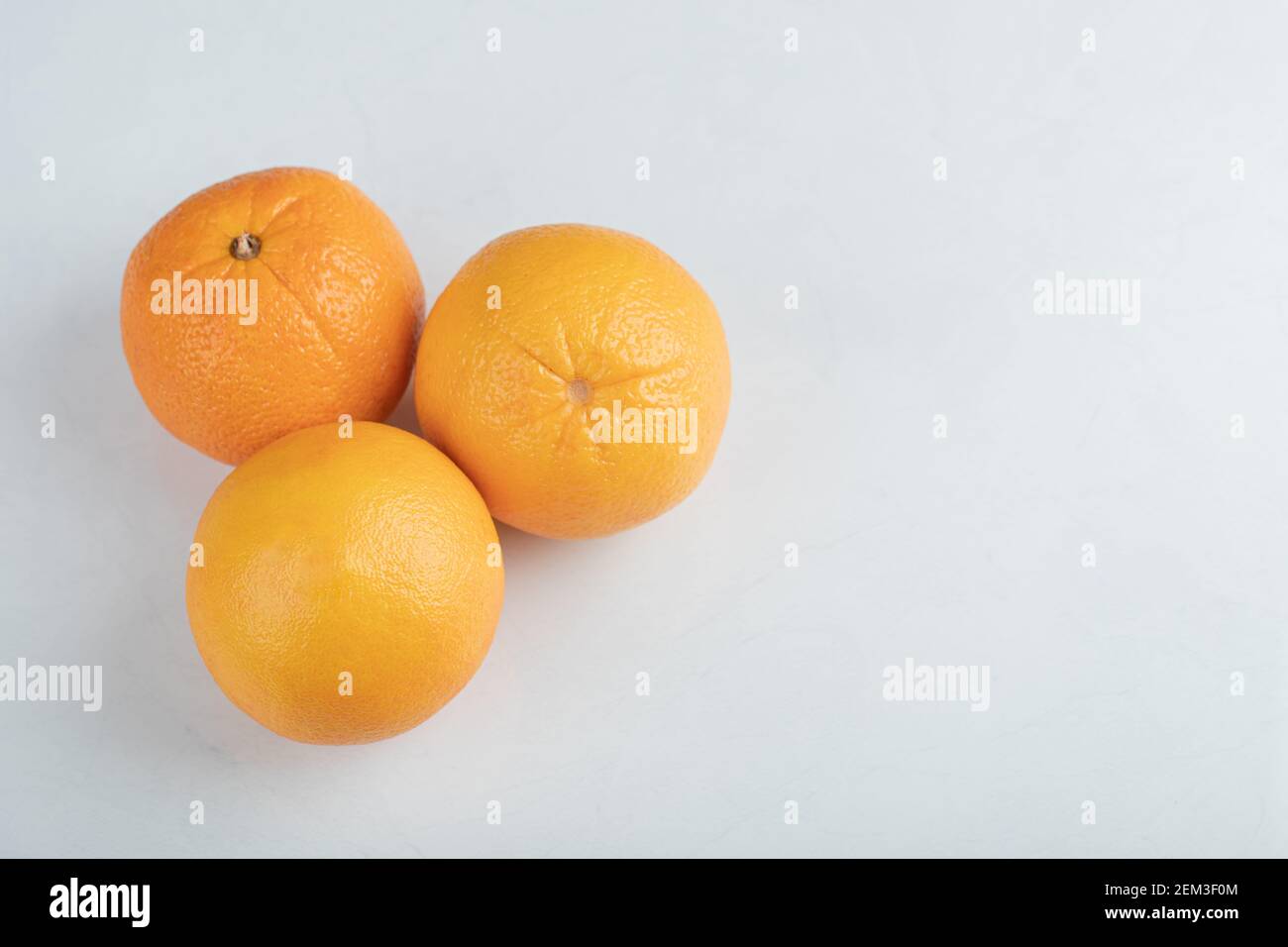 Fresh orange fruits isolated on a white background Stock Photo - Alamy