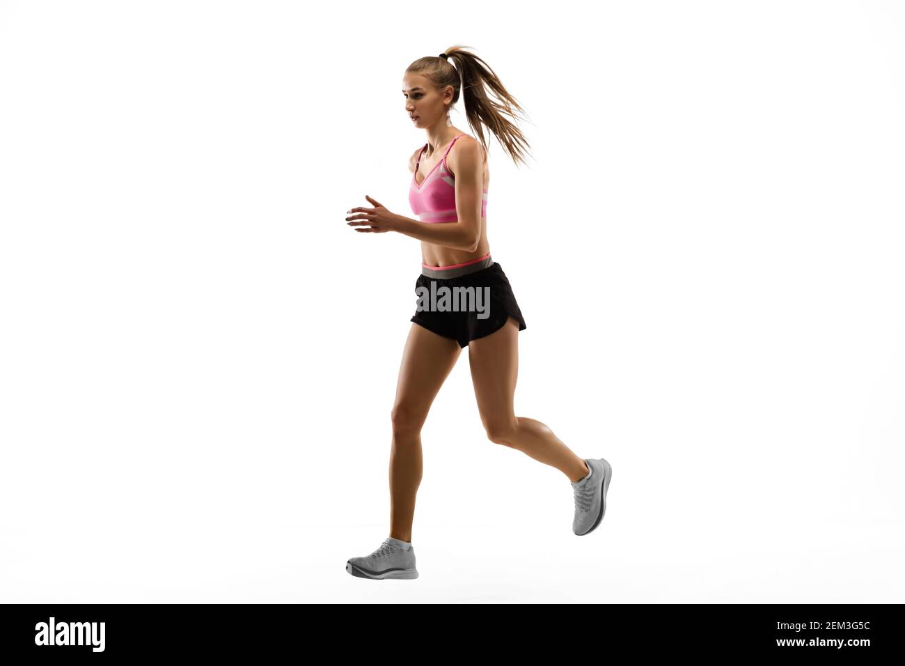 Buff Female Runner Strong. Caucasian professional female athlete, runner training isolated ...