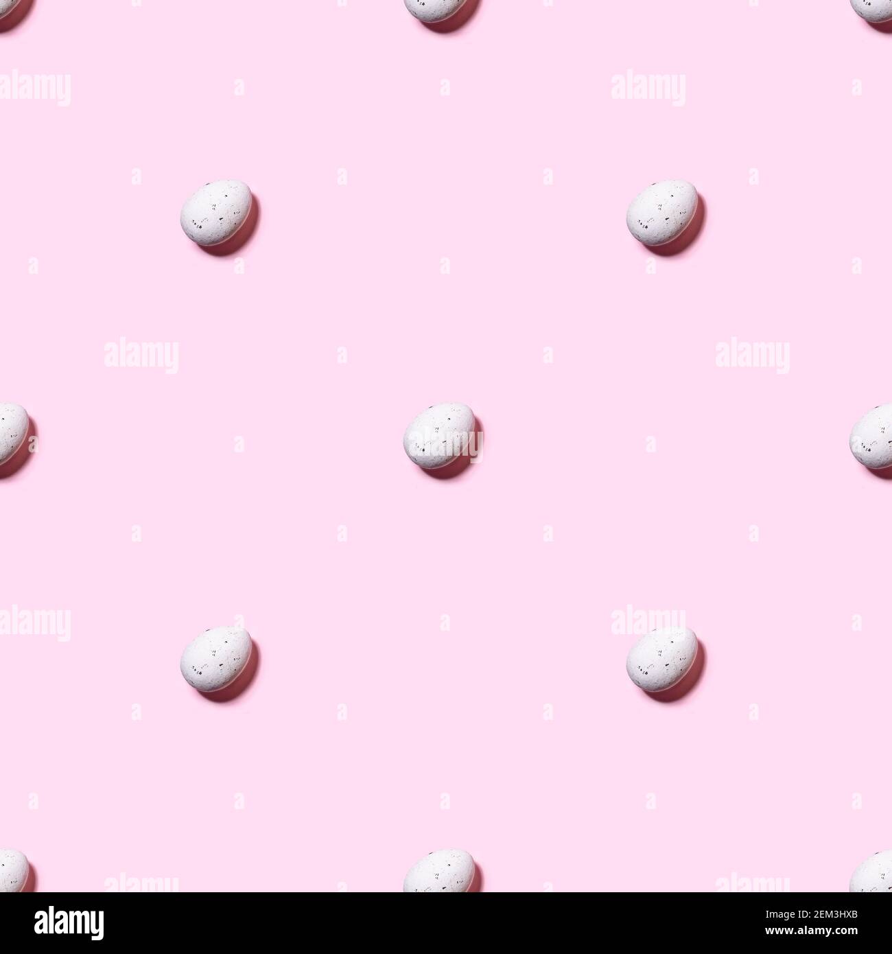 Quail eggs over pink background Stock Photo
