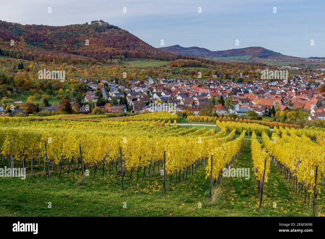 village Beuren and Hohenneuffen Fortress Ruins in autumn, Germany, Baden-Wuerttemberg Stock Photo