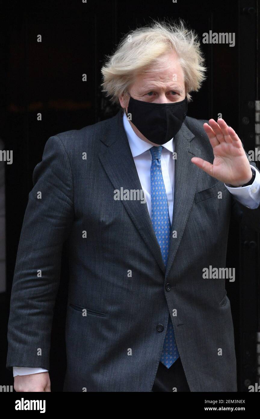 Prime Minister Boris Johnson leaves 10 Downing Street to attend Prime Minister's Questions at the Houses of Parliament, London. Picture date: Wednesday February 24, 2021. Stock Photo