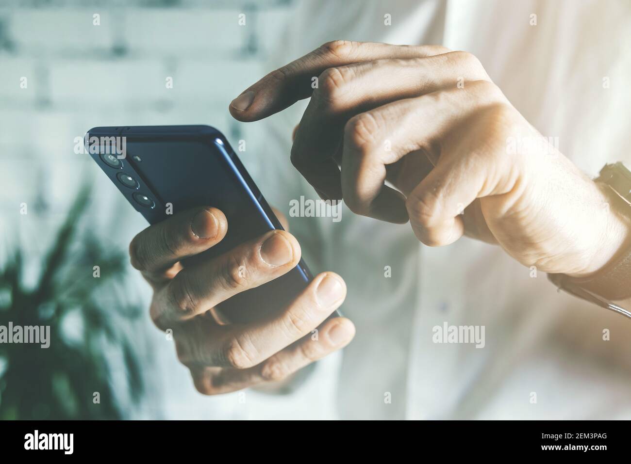 business man using smart phone in office. closeup Stock Photo