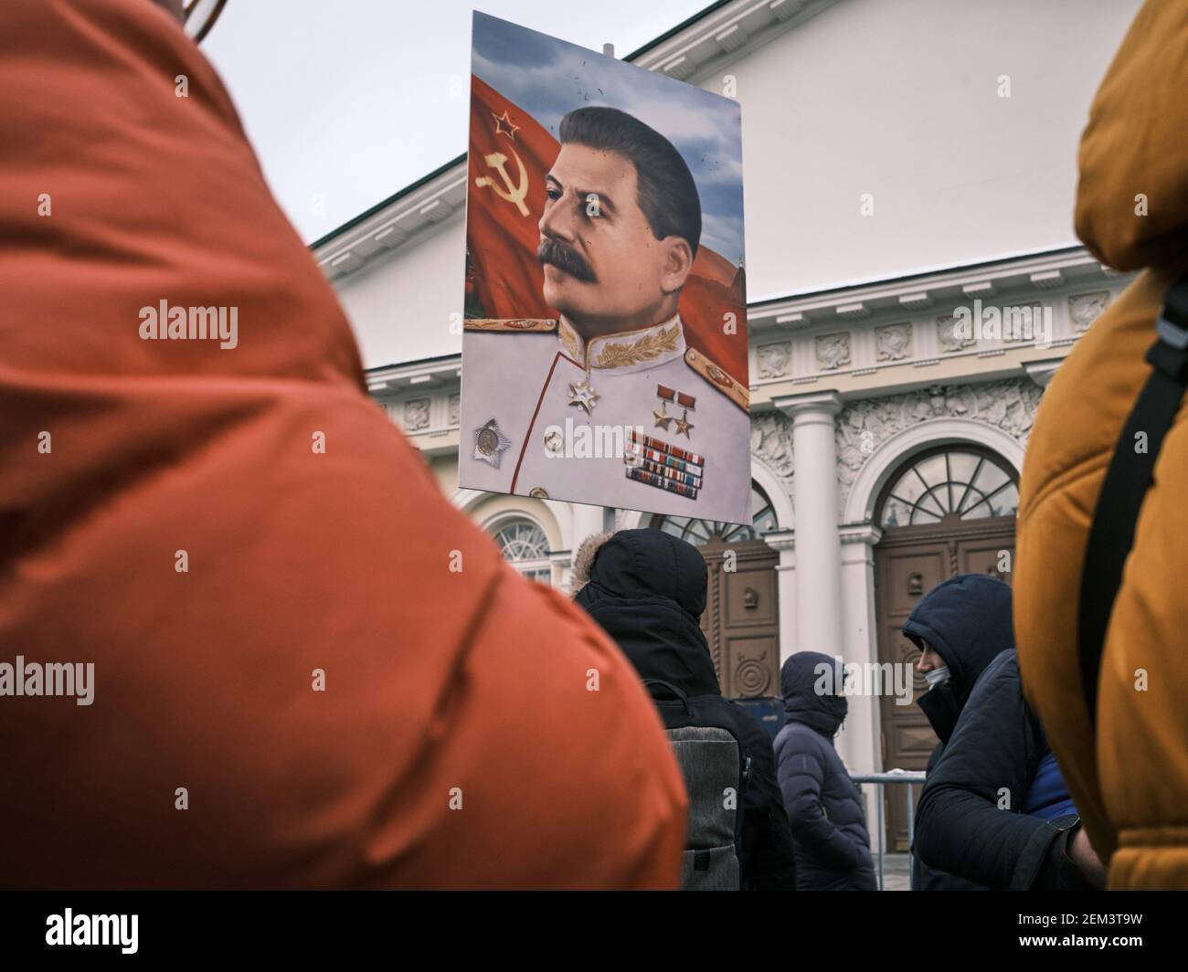 Moscow, Russia. 23rd Feb, 2021. A portrait of Joseph Stalin seen held up in a crowd of communists during a rally at the Kremlin walls. The Communist Party of the Russian Federation on Tuesday gathered activists of the Left Front, the Lenin Komsomol, the movement For New Socialism, the women's union “Hope of Russia” and other related organizations to lay flowers at the Tomb of the Unknown Soldier in the center of Moscow. Credit: SOPA Images Limited/Alamy Live News Stock Photo