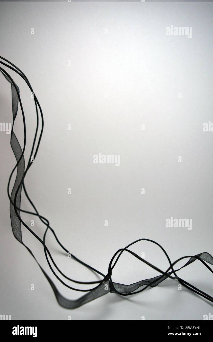 Beautiful translucent ribbons and ribbons with threads, randomly ...