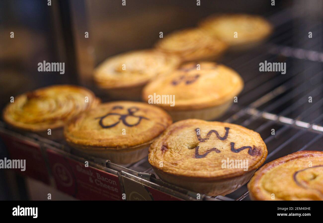 Sydney, Australia. 24th Feb, 2021. Meat pies are seen at a pie shop in Sydney, Australia, Feb. 24, 2021. An Australian meat pie is a hand-sized pie containing diced or minced