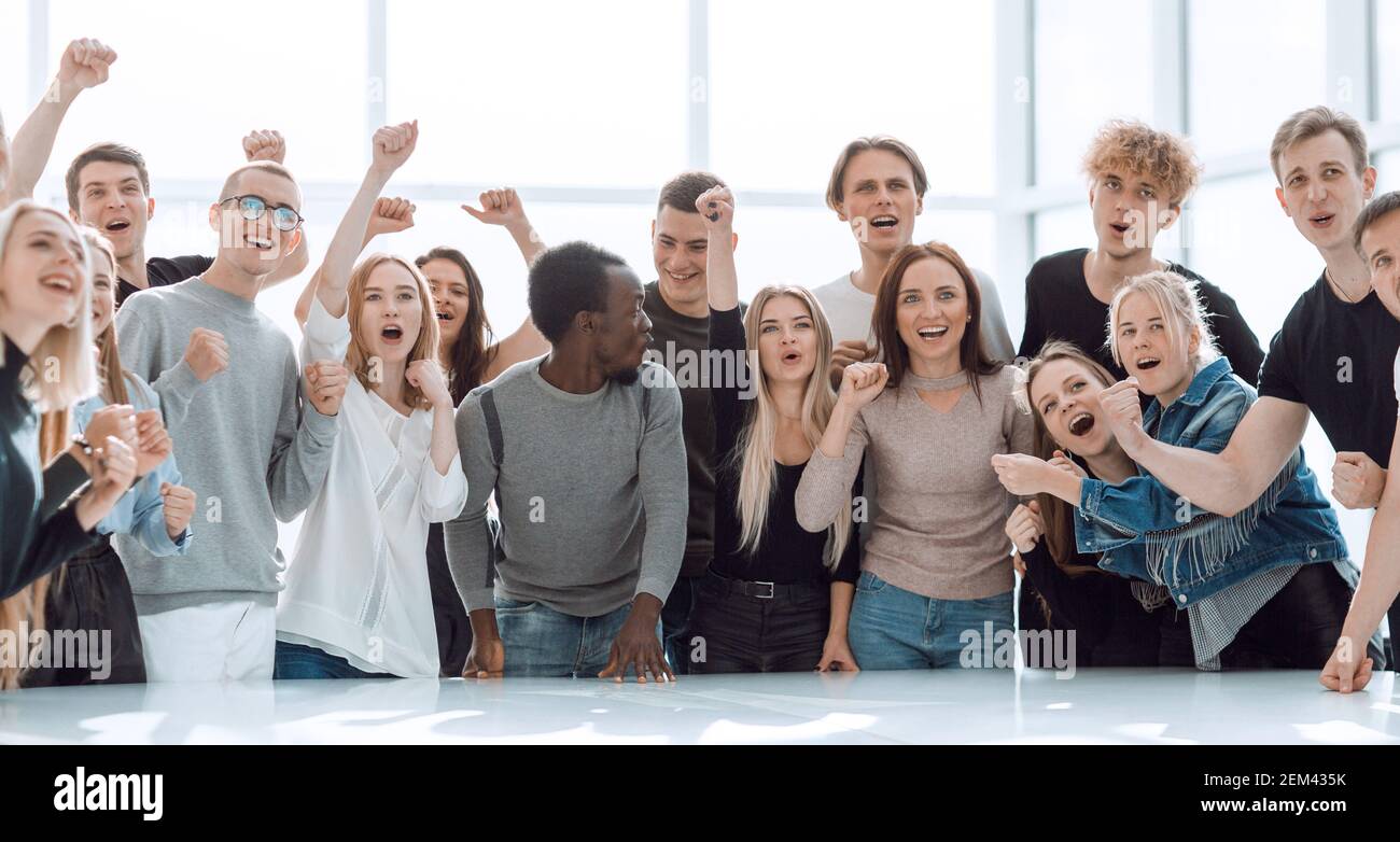 large group of happy young people standing together Stock Photo - Alamy