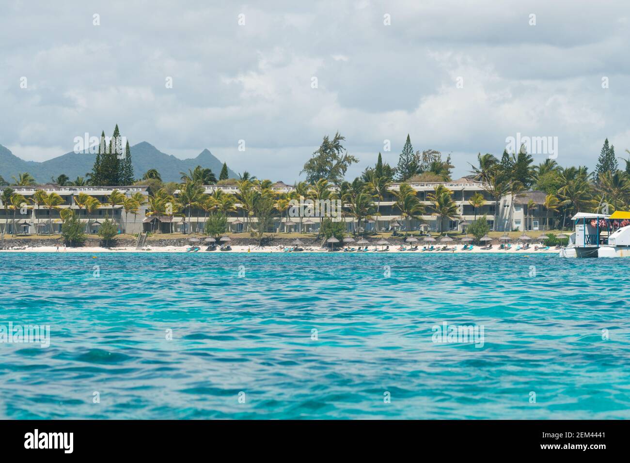 resort hotel buildings from the sea on the tropical island of Mauritius concept holiday or vacation Stock Photo