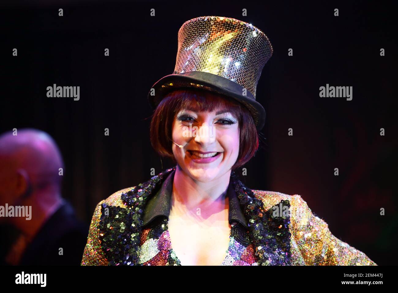 Jayde Westaby as the usherette in the Rocky Horror Show performing on stage at a press call at the Playhouse Theatre in London's West End Stock Photo
