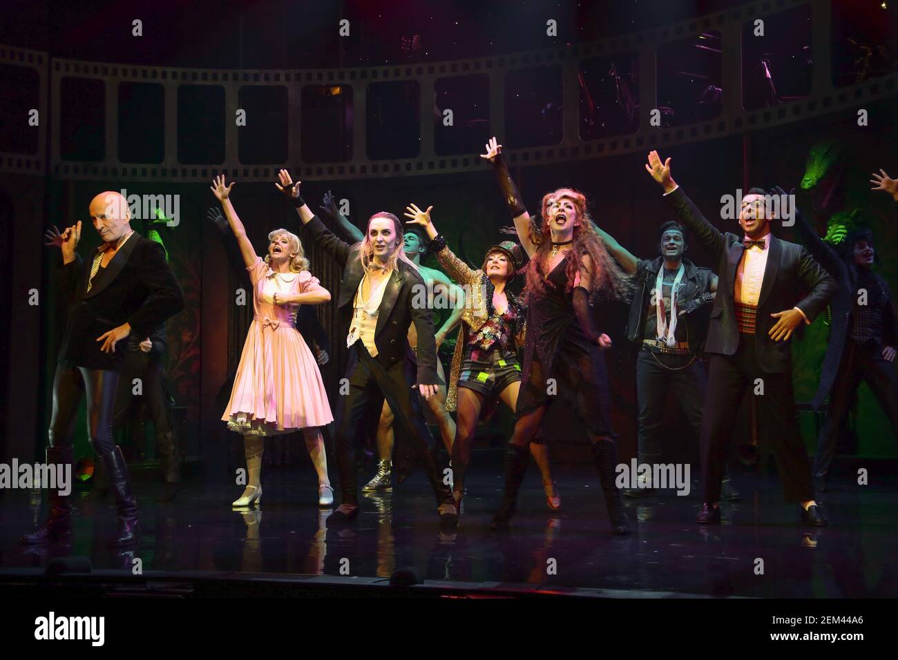 The cast of the Rocky Horror Show performing on stage at a press call