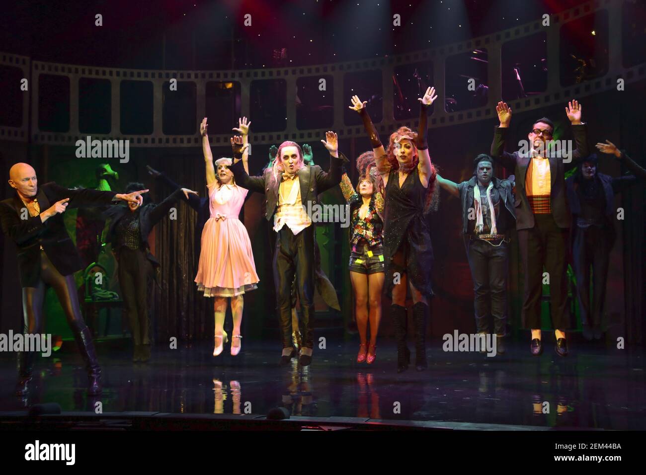 The cast of the Rocky Horror Show performing on stage at a press call