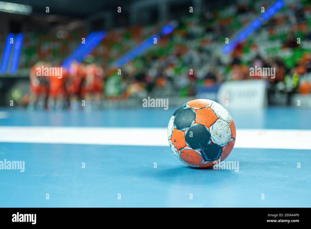 The ball on the parquet during time in handball match Stock Photo - Alamy