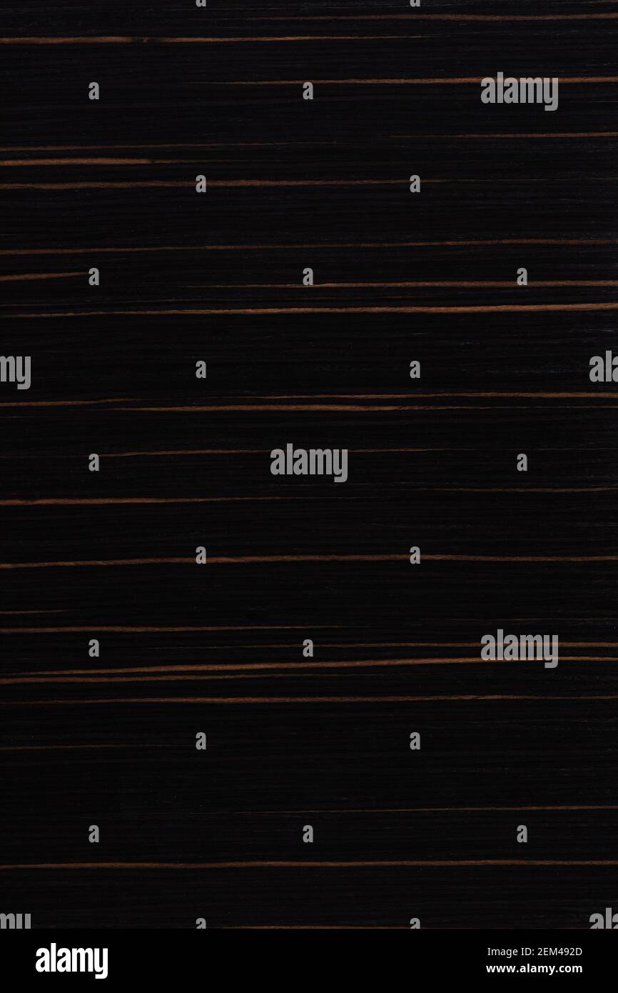 Ammara Ebony veneer background, texture in strict dark color for interior look. Stock Photo