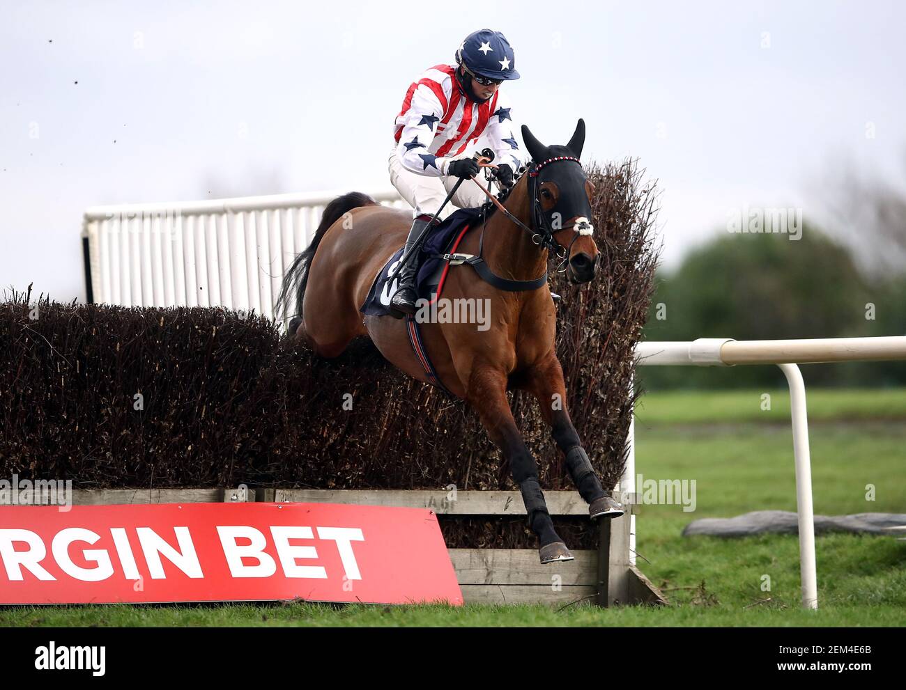 Beau Bay ridden by jockey Charlie Hammond clears the last fence on the way to winning the Virgin Bet Veterans' Handicap Chase (Leg 2 Of The Veterans' Chase Series) at Doncaster Racecourse. Picture date: Wednesday February 24, 2021. Stock Photo