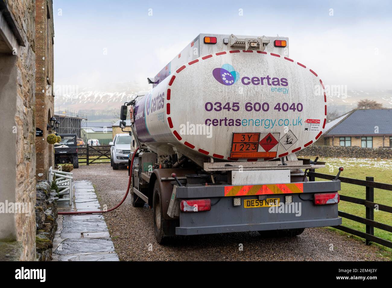 Delivery of heating oil to a rural domestic property, North Yorkshire, UK Stock Photo