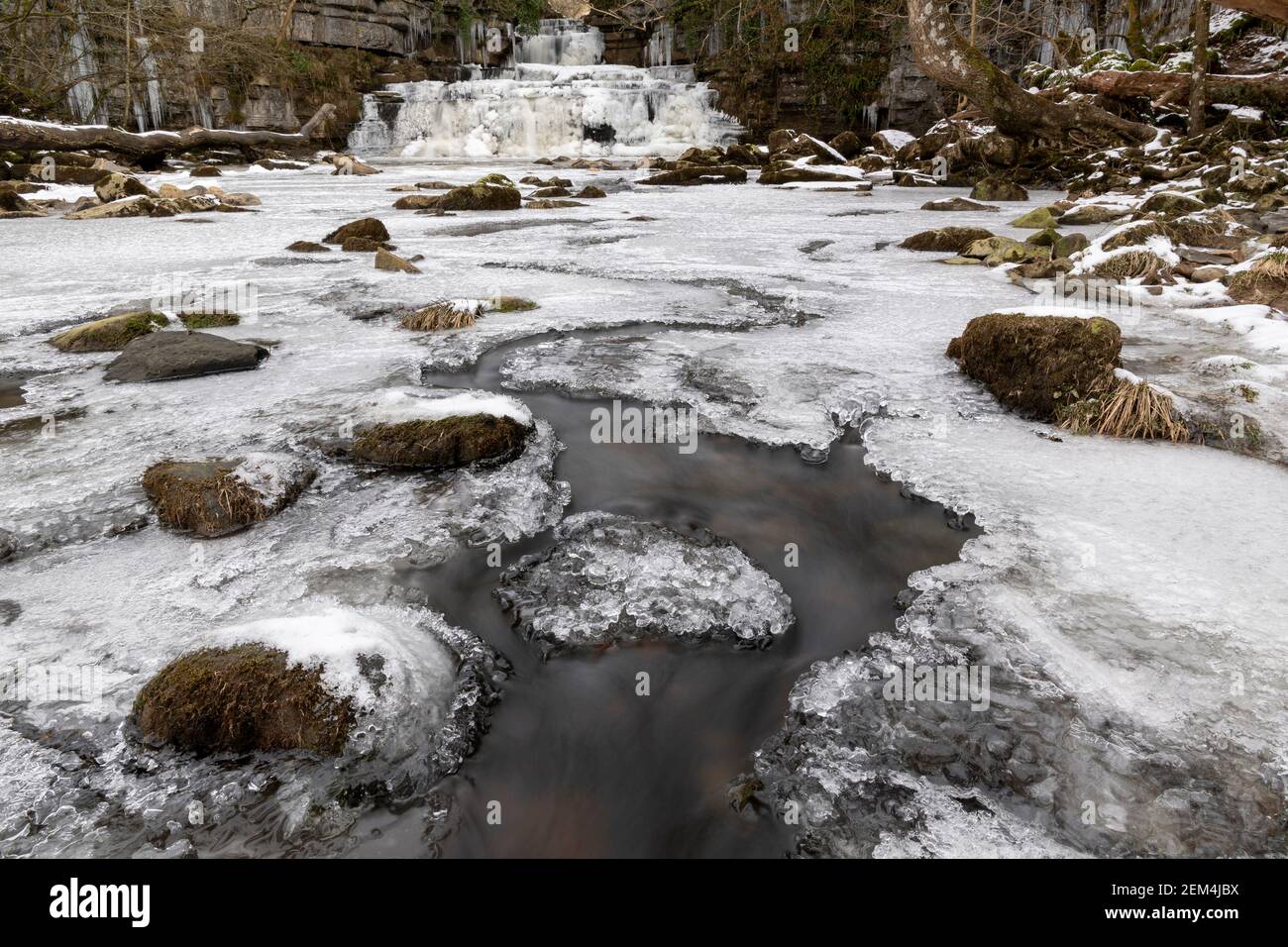 Cotter Force in the Yorkshire Dales National Park covered in ice during a cold spell. North Yorkshire, UK. Stock Photo