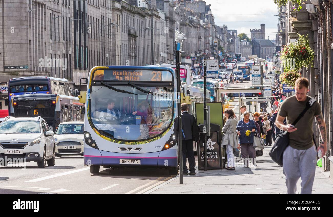 Single decker First bus at a stop in Union Street in the city centre of Aberdeen, Scotland Stock Photo