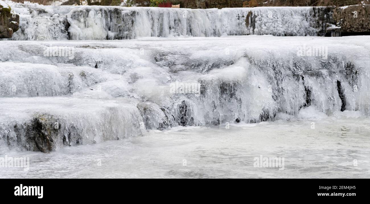 Froze waterfall on Gayle Beck, Hawes, Yorkshire Dales National Park, UK. Stock Photo