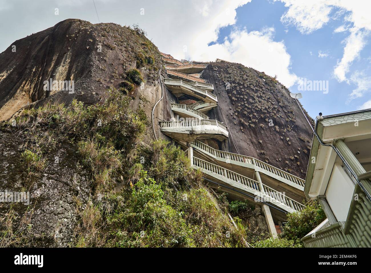 The Rock of Guatape, El Penon de Guatape, also La Piedra or El Penol, is a landmark inselberg also known as The Stone of El Penol, La Piedra del Penol Stock Photo
