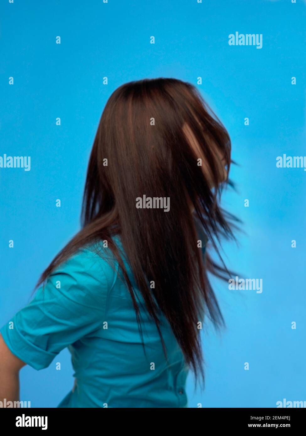 Close-up of a teenage girl with tousled hair Stock Photo