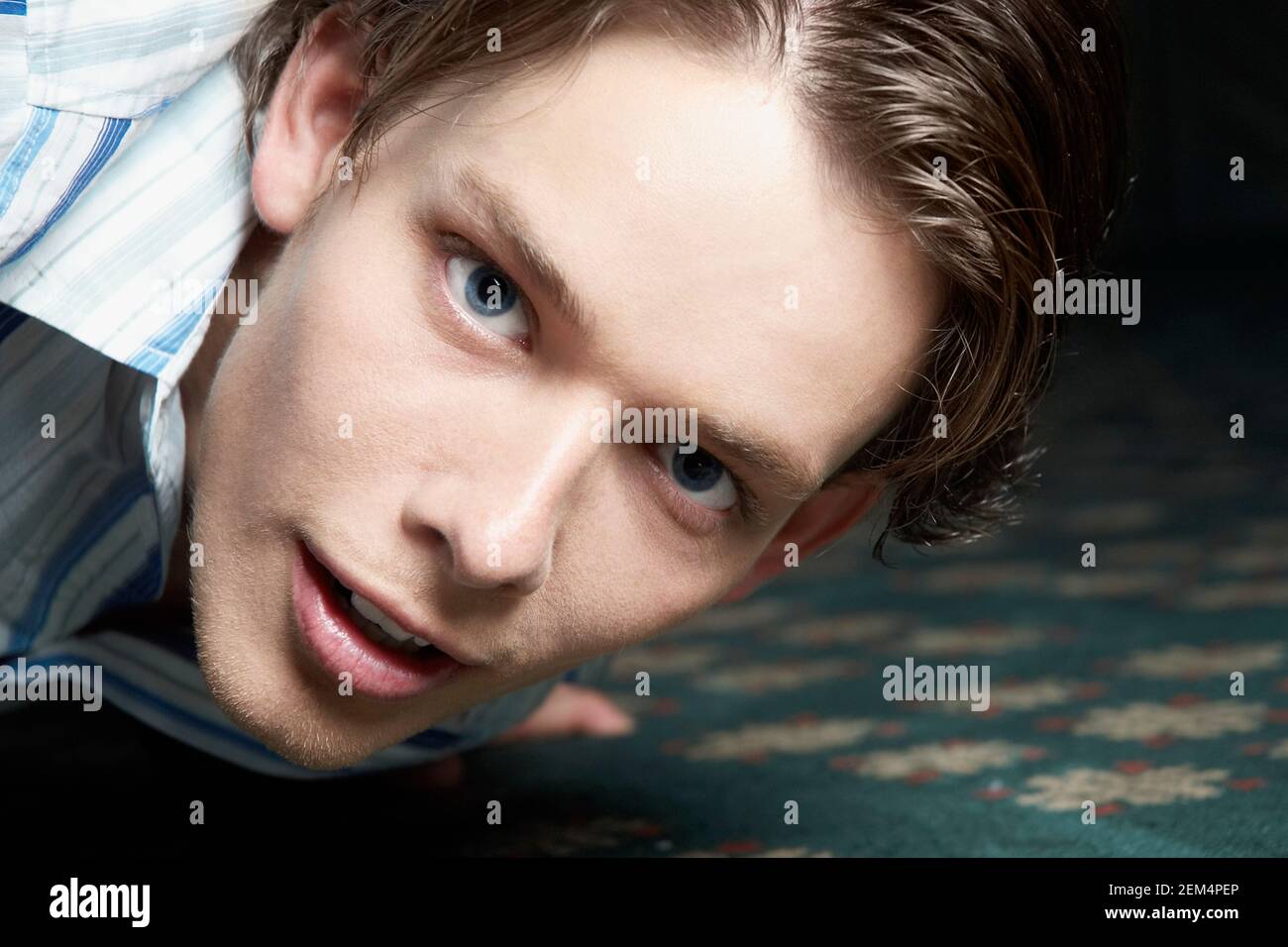 Portrait of a young man smiling Stock Photo - Alamy