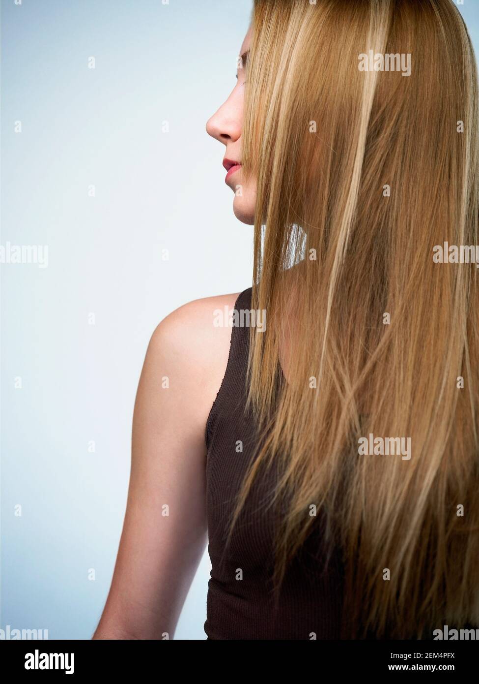 Close-up of a young woman looking sideways Stock Photo