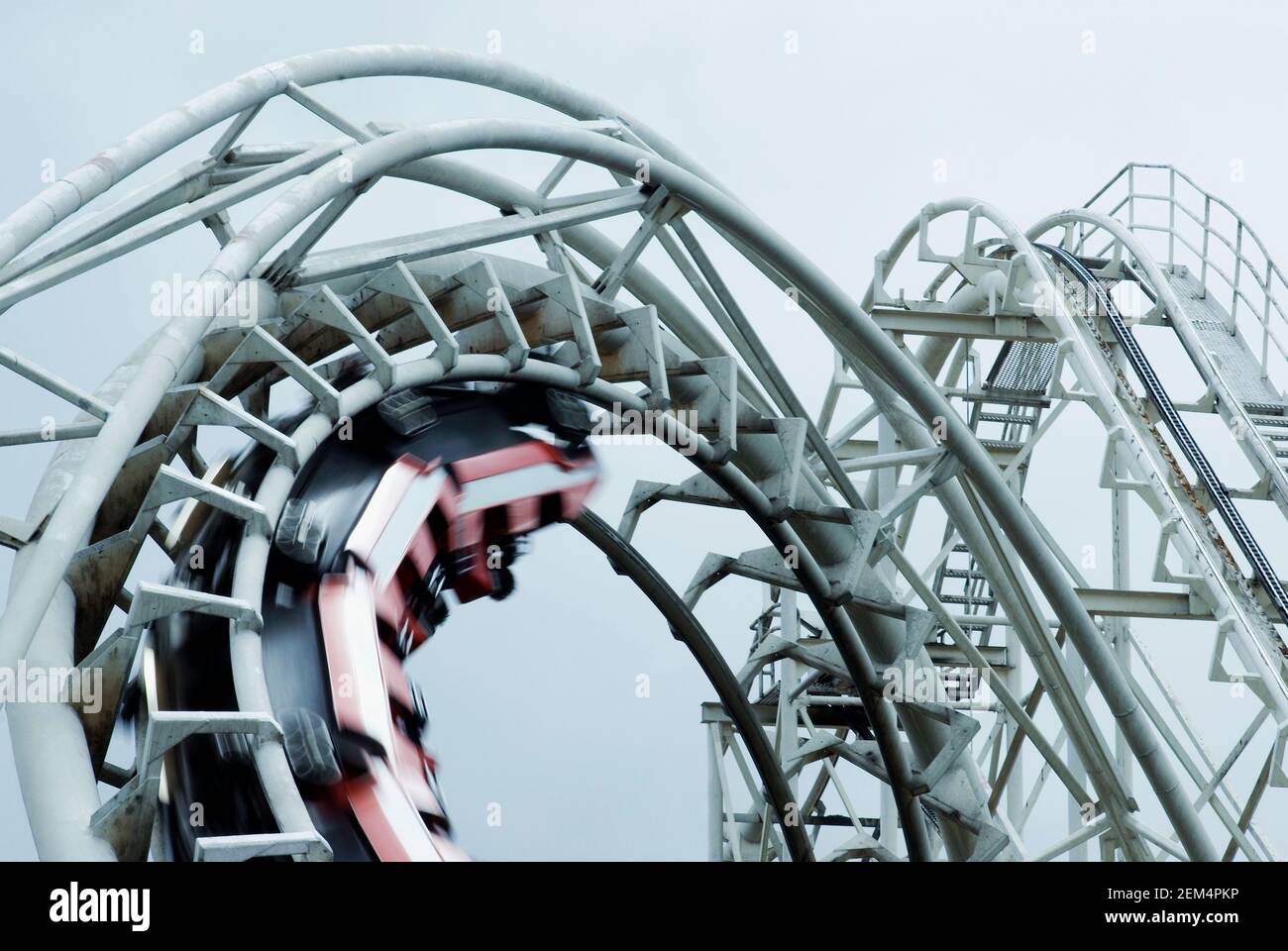 Low angle view of a rollercoaster in motion Stock Photo