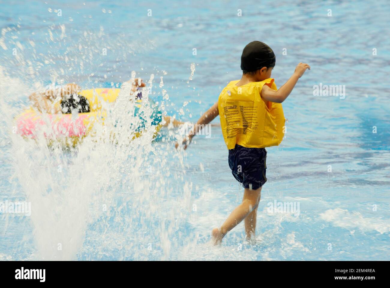 Children playing in water Stock Photo