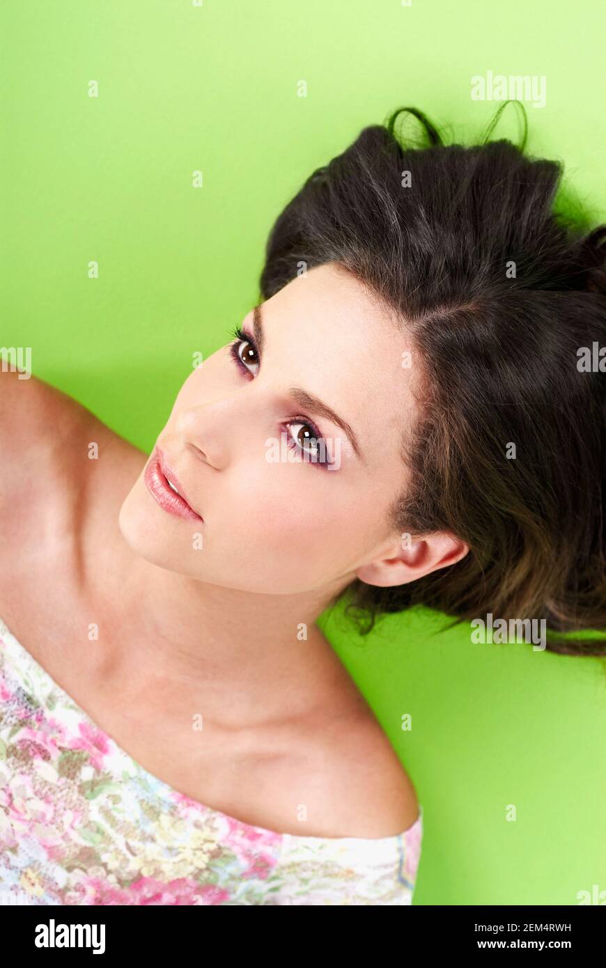 High angle view of a young woman lying down Stock Photo