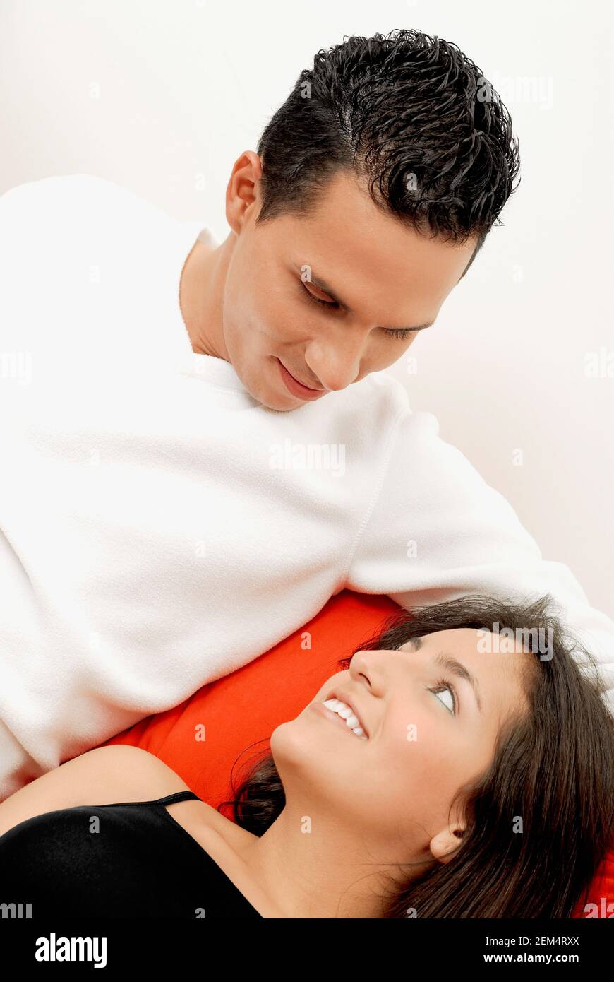 Close-up of a young couple looking at each other Stock Photo