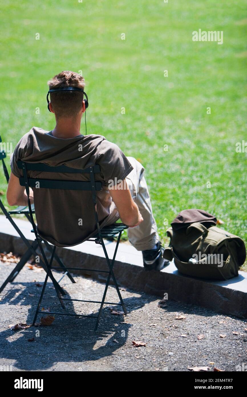 Man sitting chair and rear view hi-res stock photography and images - Alamy