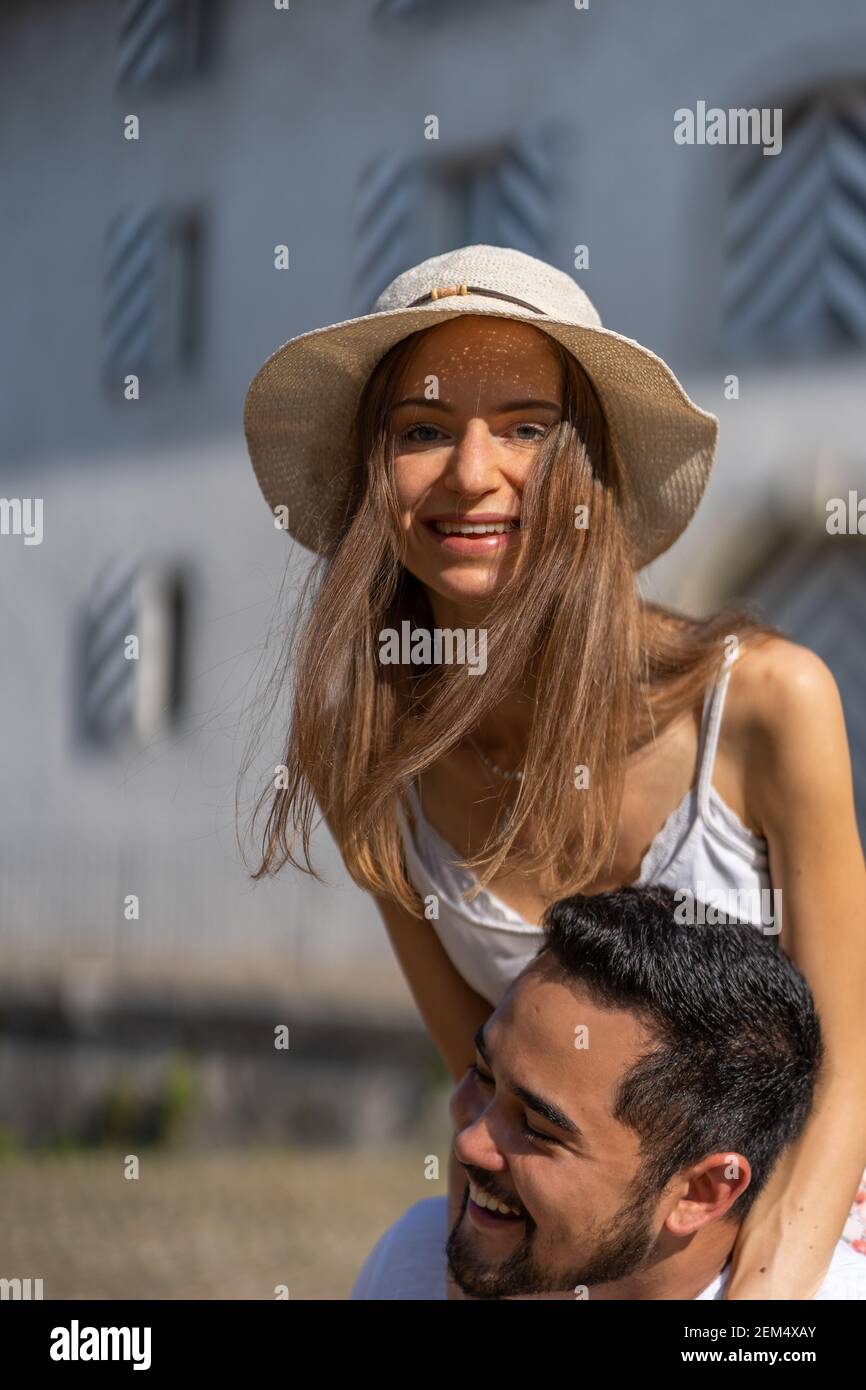 Man shoulder carrying woman hi-res stock photography and images - Alamy