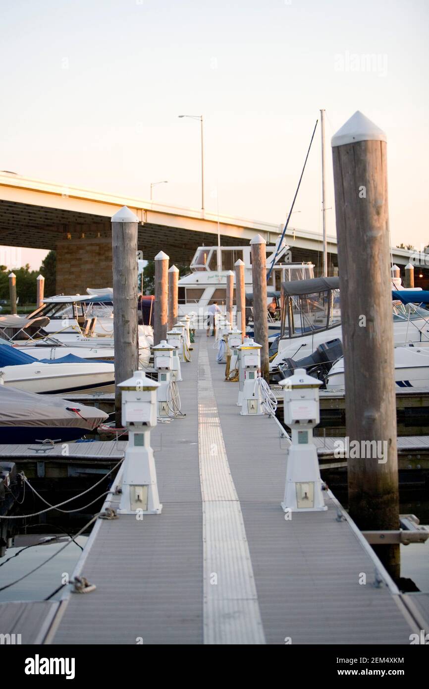 Tour boats moored at a dock Stock Photo - Alamy