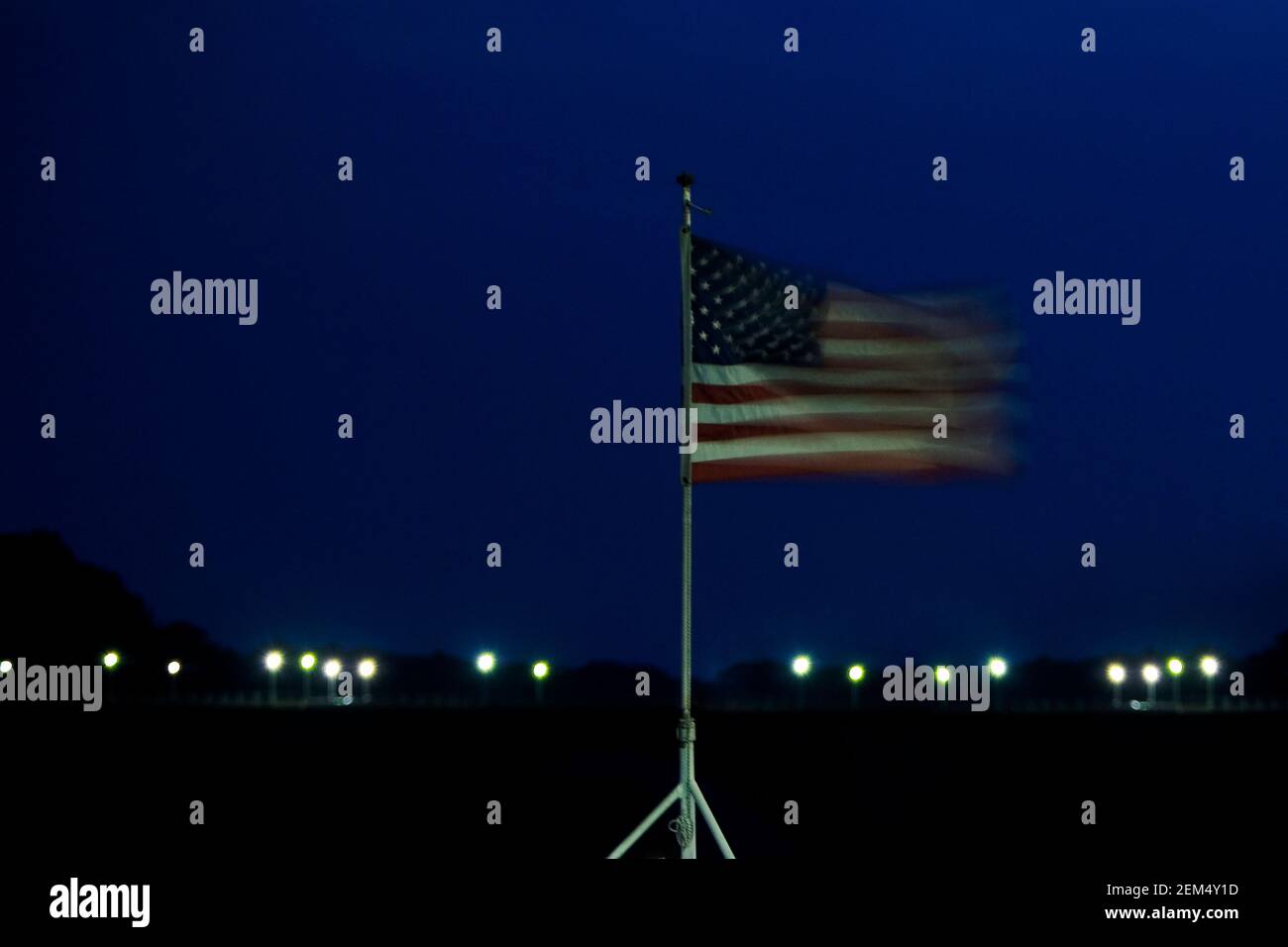 American flag fluttering at night Stock Photo Alamy