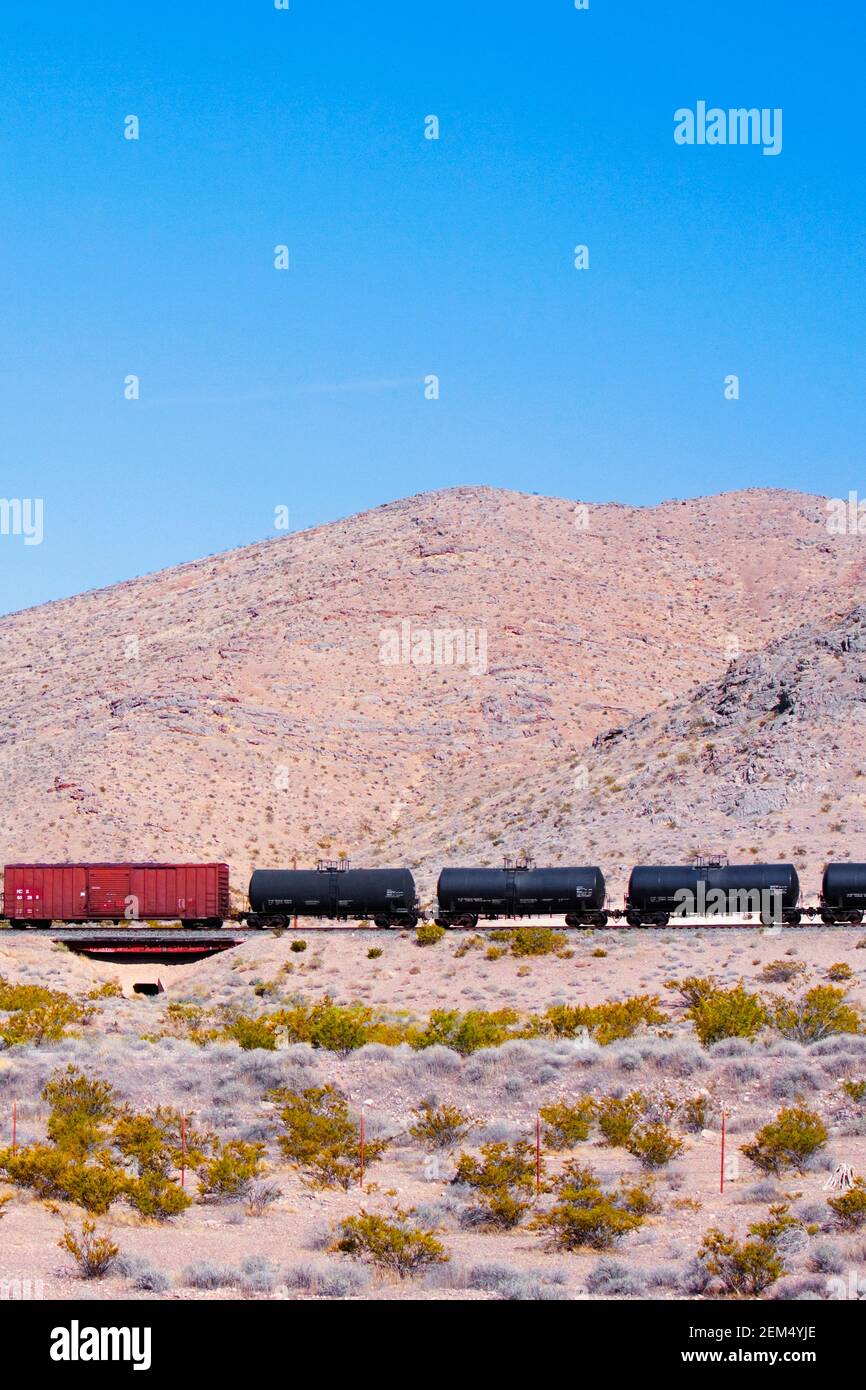 Freight train passing through an arid landscape, Las Vegas, Nevada, USA Stock Photo Alamy
