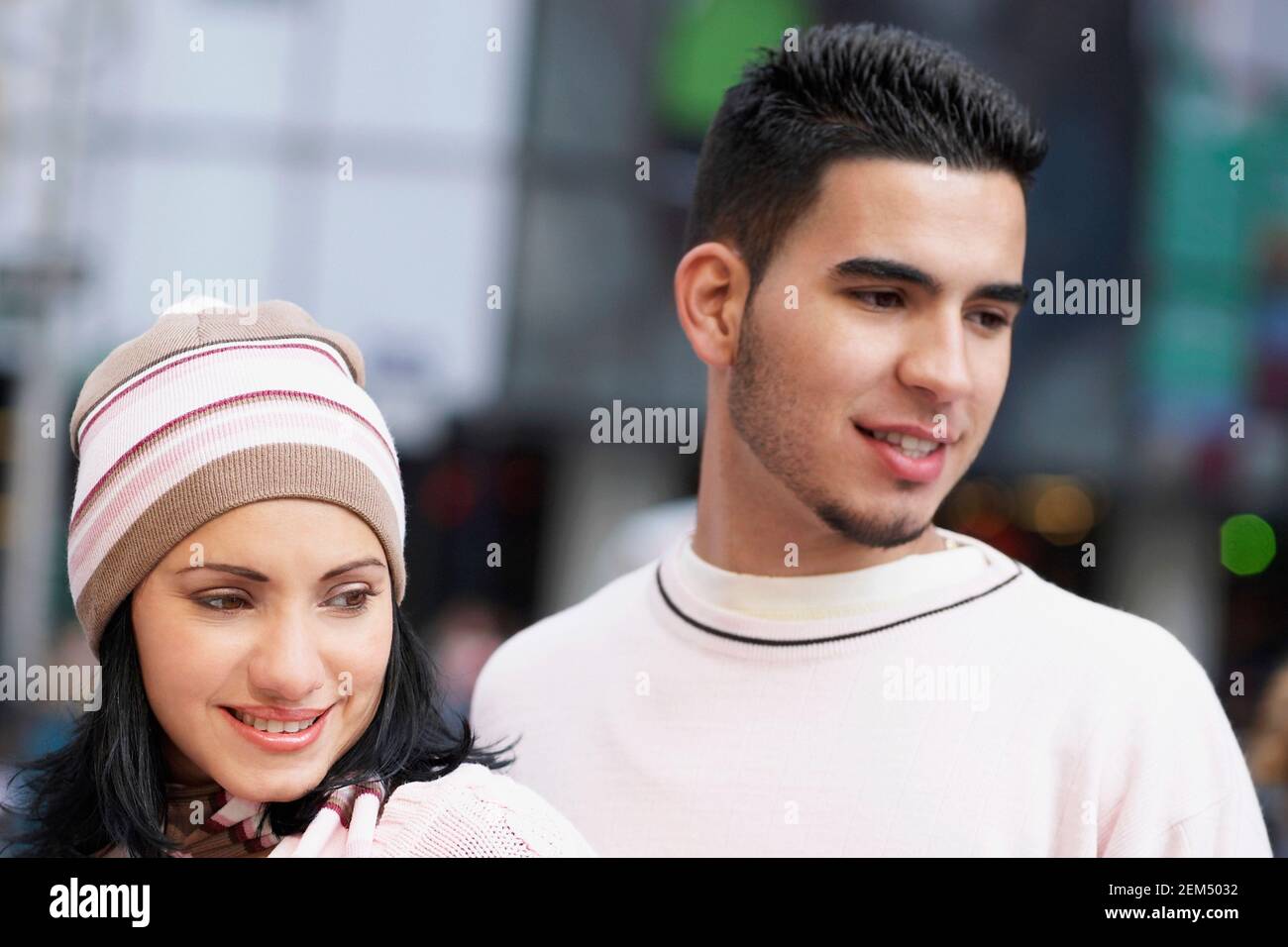 Close-up of a mid adult man and a young woman smiling Stock Photo - Alamy