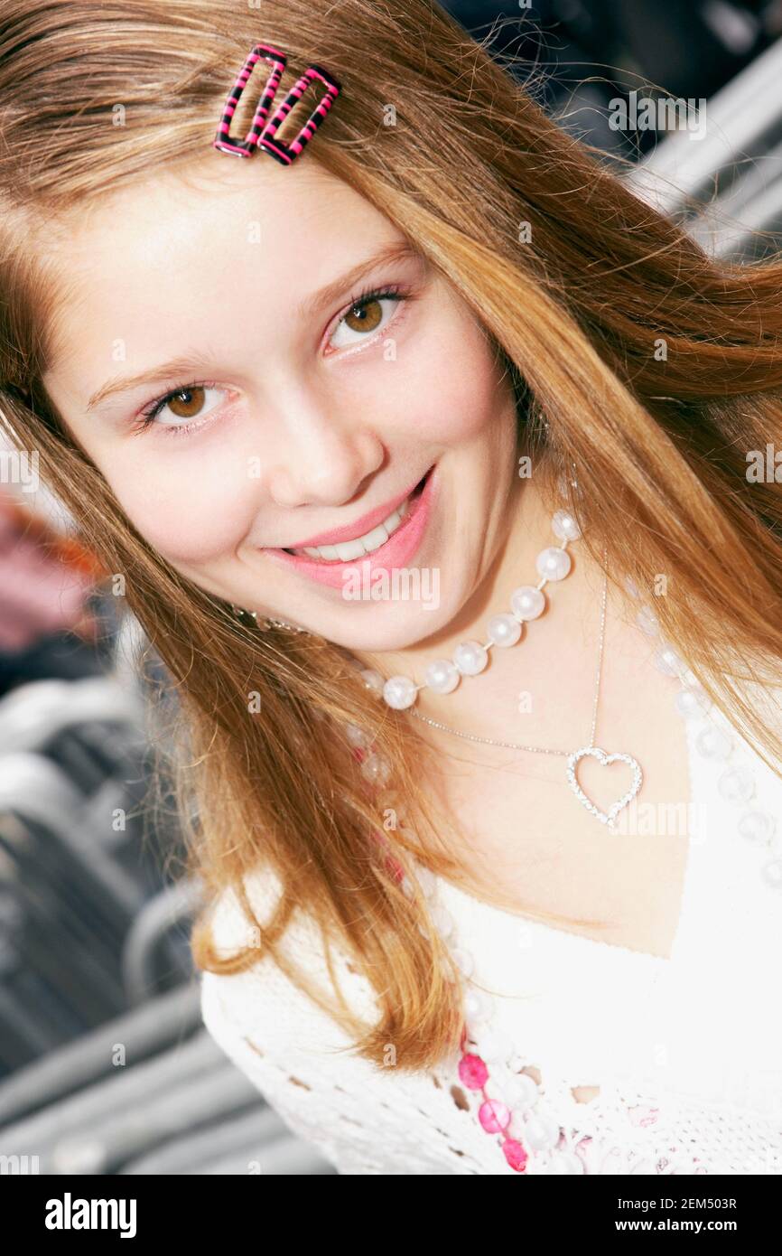 Portrait of a teenage girl smiling Stock Photo - Alamy
