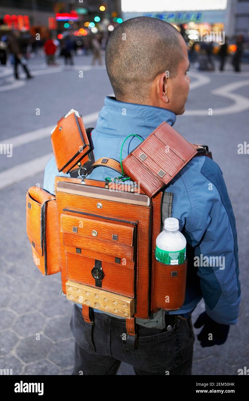 Rear view of a mid adult man carrying a backpack Stock Photo