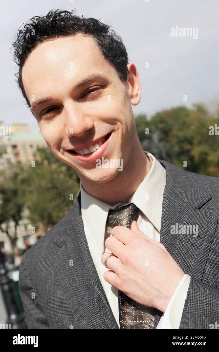 Portrait of a young man smiling Stock Photo - Alamy