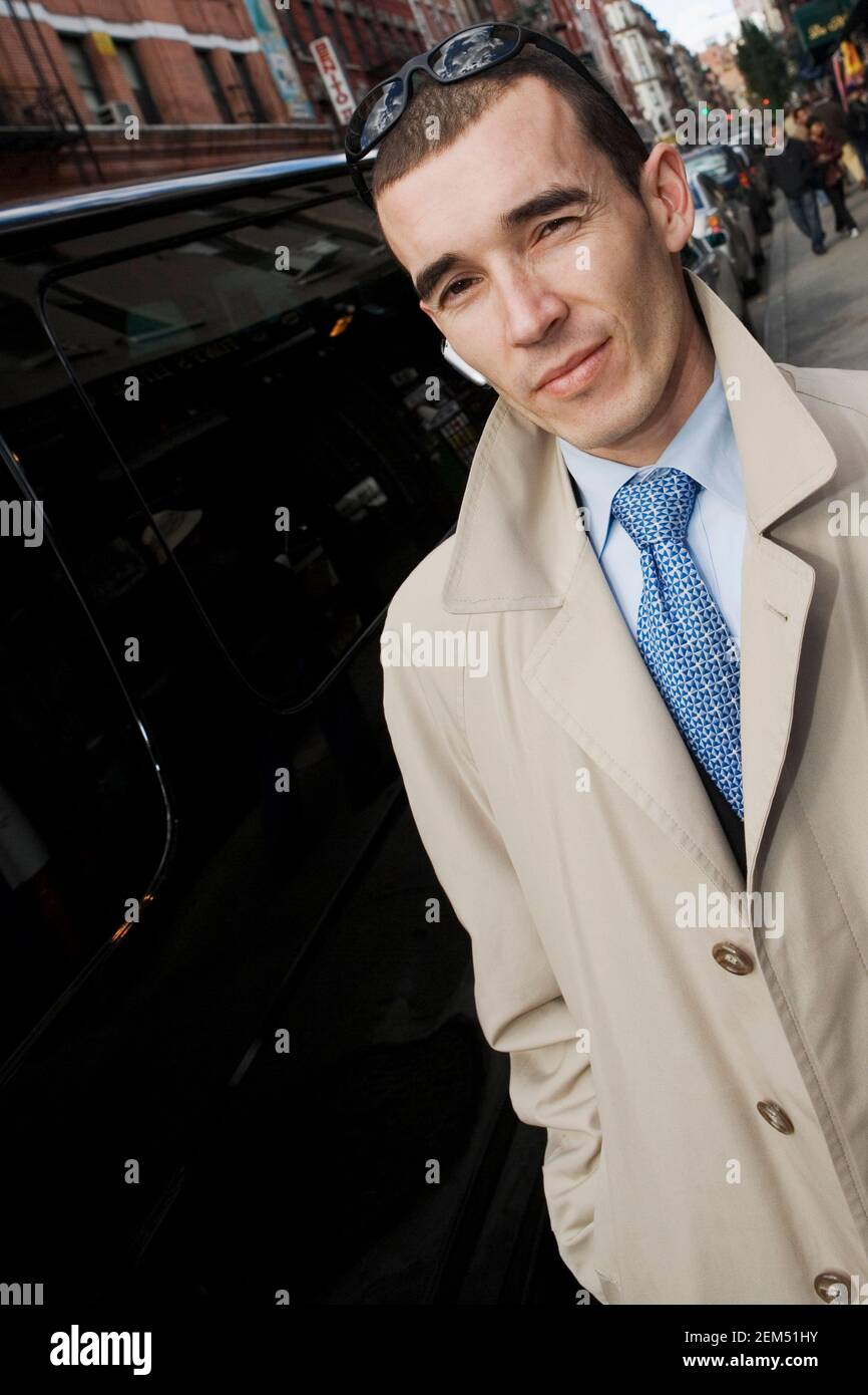 Portrait of a businessman on the sidewalk Stock Photo