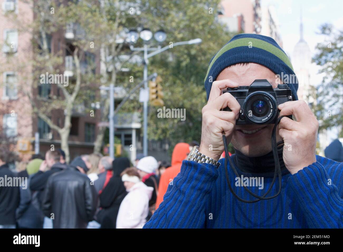 Close-up of a mid adult man taking a picture Stock Photo