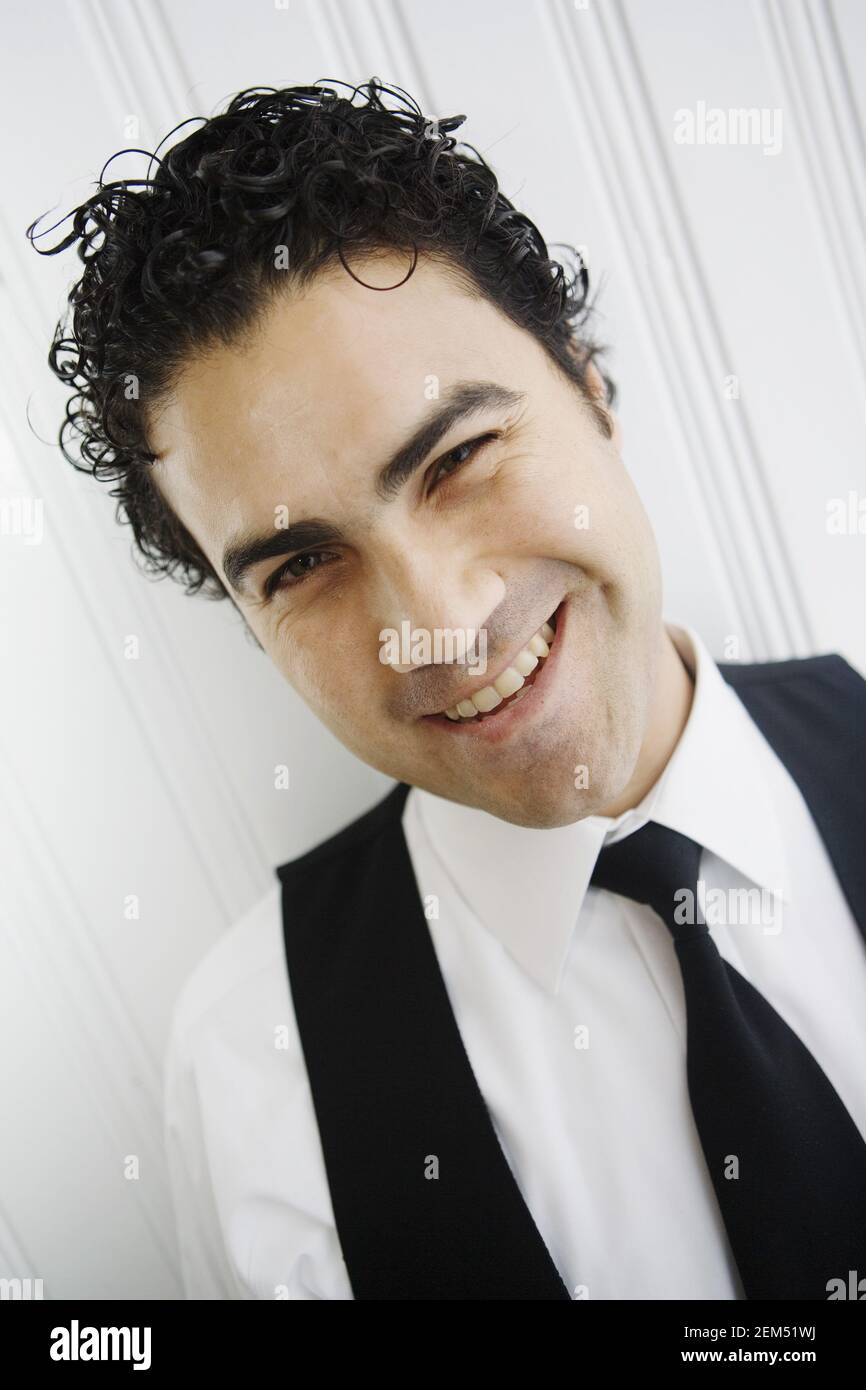 Portrait of a waiter smiling Stock Photo