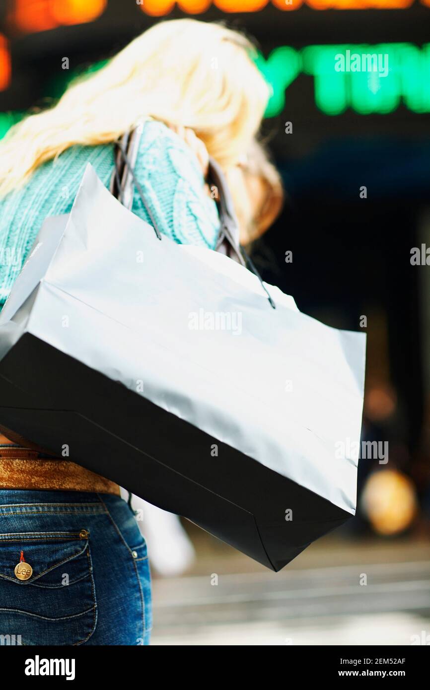 Rear view of a teenage girl carrying a bag on her shoulder Stock Photo ...